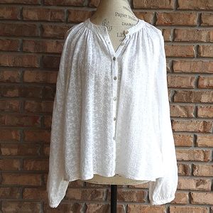 Free People white peasant boho style top with eyelet detail.